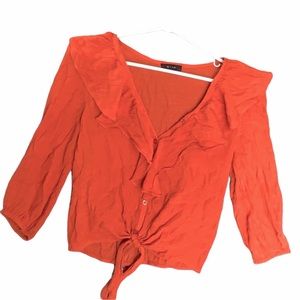 Plunging burnt orange/rust top